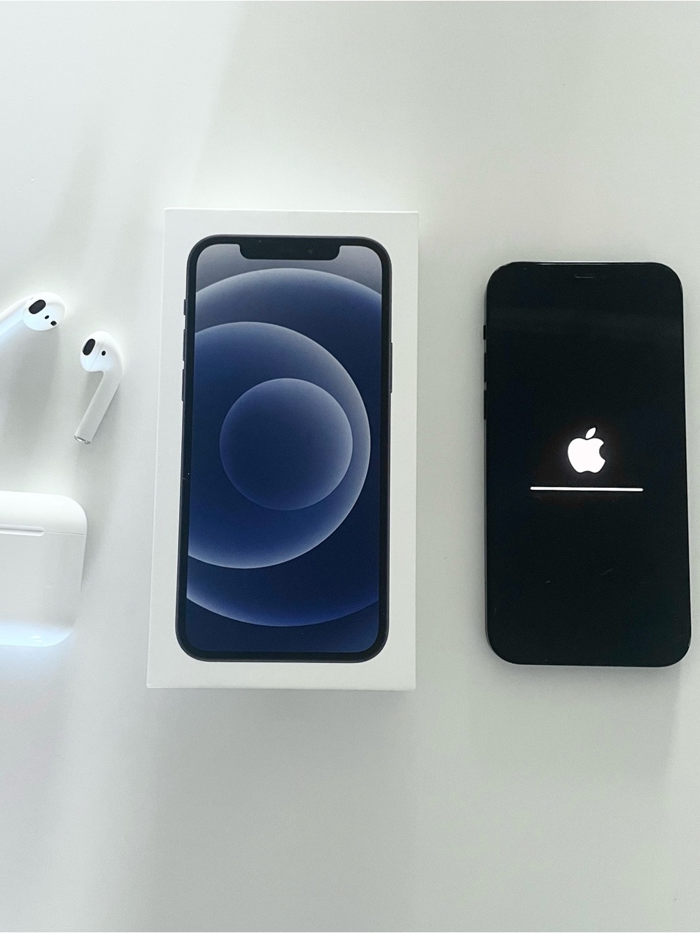 Apple iPhone in Black with White AirPods and Box (unlocked)